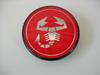 A112 Abarth wheel cap emblem. Scorpion on red backing, � 58mm. Plastic.