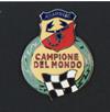 "Abarth & C. - Campione del Mondo" enamel emblem. Chequered flag on yellow background.