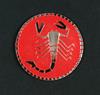 Chromed scorpion over red painted backing wheel cap emblem, � 56mm.