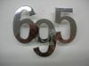 Large "695" chromed logo. Length: 110mm. Rear engine hood 1964 - 72.