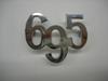Small "695" chromed logo. Length: 60mm.